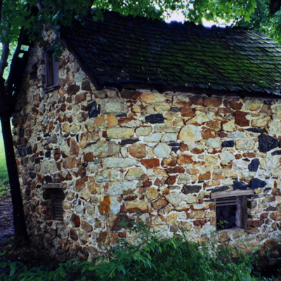 an old spring house before architectural restoration