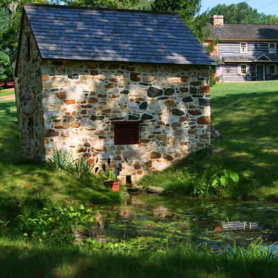 a fully restored spring house including a new roof and windows