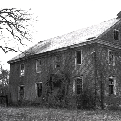 an old brick building in need of significant restoration