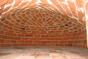 Restored brickwork inside a beehive bake oven