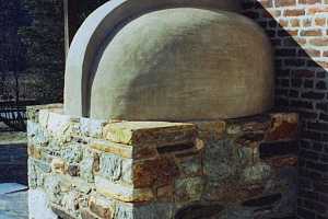 The outside view of a fully restored squirrel tail bake oven