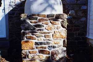 Looking at the outside of a restored beehive oven