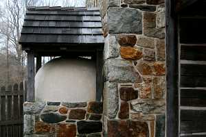 Looking at the outside of a restored beehive oven