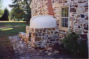 A fully restored squirrel tail bake oven