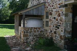 A fully restored squirrel tail bake oven