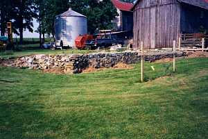 an empty foundation after the shed was removed