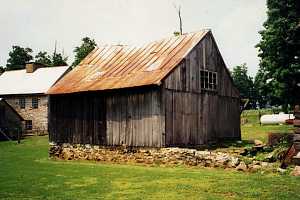 old shed on crumbling foundation in need of significant renovation