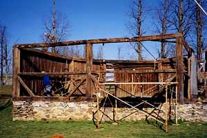 old shed structure being disassembled