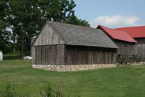 brand new shed on top of rebuilt stone foundation