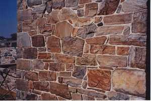 a restored stone wall of a barn