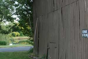 barn damage before restoration