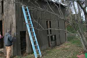 barn exterior being prepped for restoration