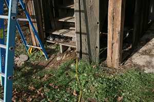 wooden barn being prepped for restoration