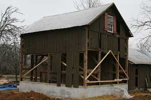 barn secured to new concrete foundation