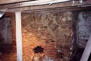 an old brick basement needing refinishing