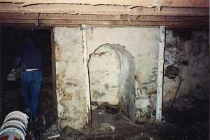 an old concrete basement with dirt floor