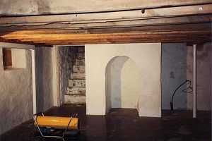 a refinished concrete basement with polished floor