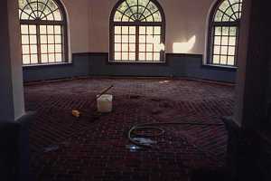 a brick floor inside a round room