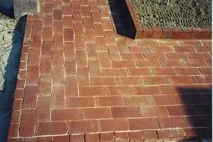 a closeup of a brick patios corner