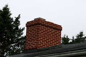 A fully repaired brick chimney