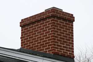 A fully repaired brick chimney