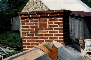 A repaired brick chimney