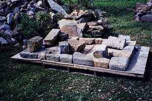 Stone being laid out for a chimney