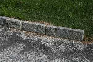 A close-up of cobblestone lining of a modern driveway