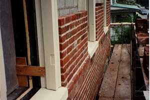 reframing of windows on an old brick home