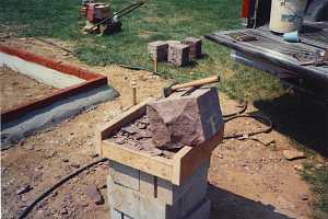 A large stone being prepped for cutting