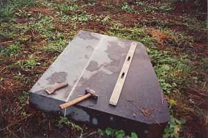 Large stone with a guide painted on for precise cutting