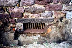 Restored custom cut stone grate