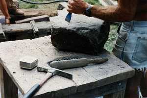 A stone being cut by a professional stonemason
