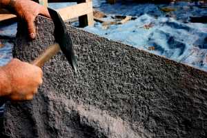 Large stone being formed by a pickaxe