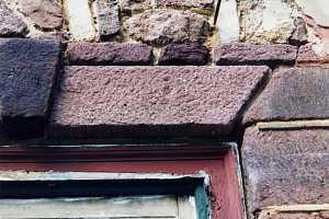 A restored stone window frame