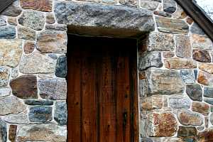 A stone chapel with custom cut stone