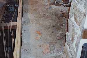 an old fireplace hearth concrete foundation