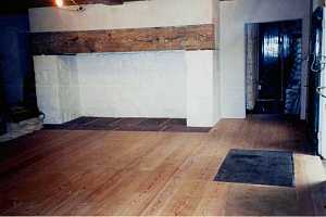 a restored fireplace in a historic home - after