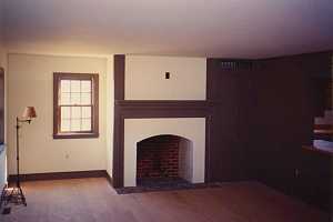 an empty brick fireplace