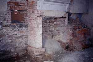 an old fireplace and home with crumbling stone and bricks