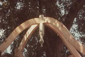 the decorative arched top of wooden gazebo