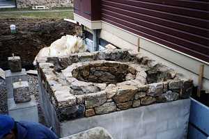 old stone well cap