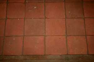 a red brick walk made with custom bricks