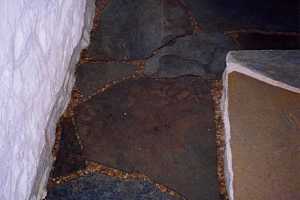 A stone walkway around a corner