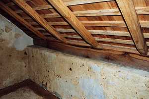 The inside of an old spring house - Before restoration