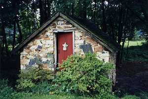 A 1794 spring house with red door