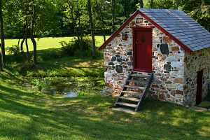 A fully restored stone spring house