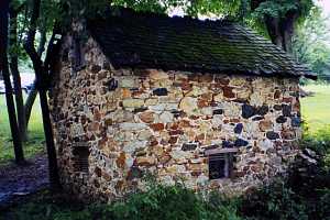 A restored stone spring house