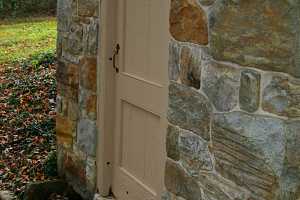 The door leading inside a spring house