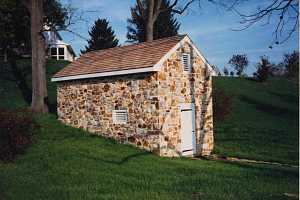 A fully restored stone spring house